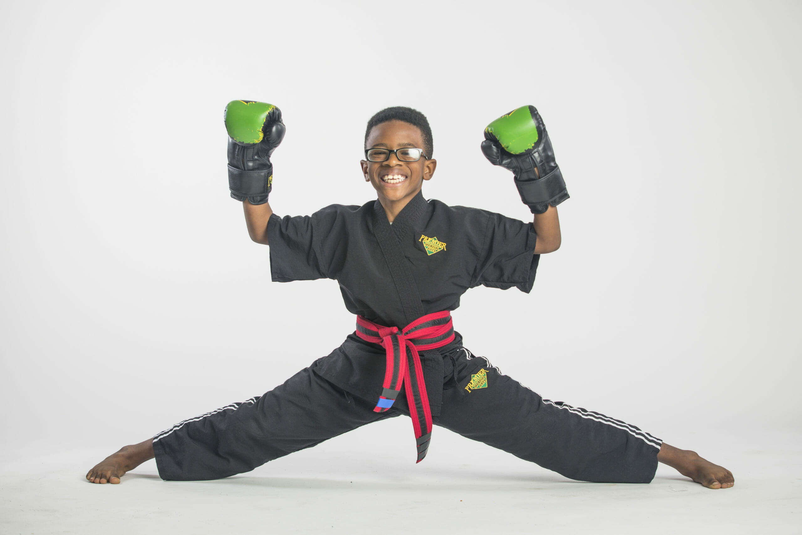 happy boy in karate gear