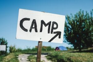 A sign that says camp 